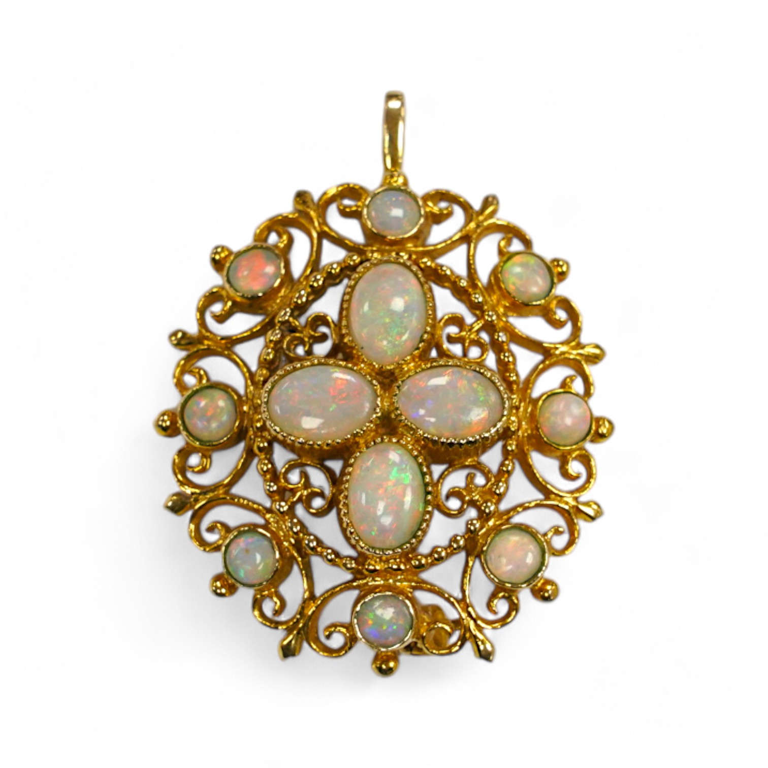 A modern 9ct gold and white opal cluster set oval pendant brooch, 33mm, gross weight 8.7 grams. Condition - fair to good